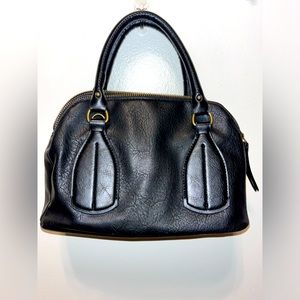 Never used small clutch type black purse with included wristlet!